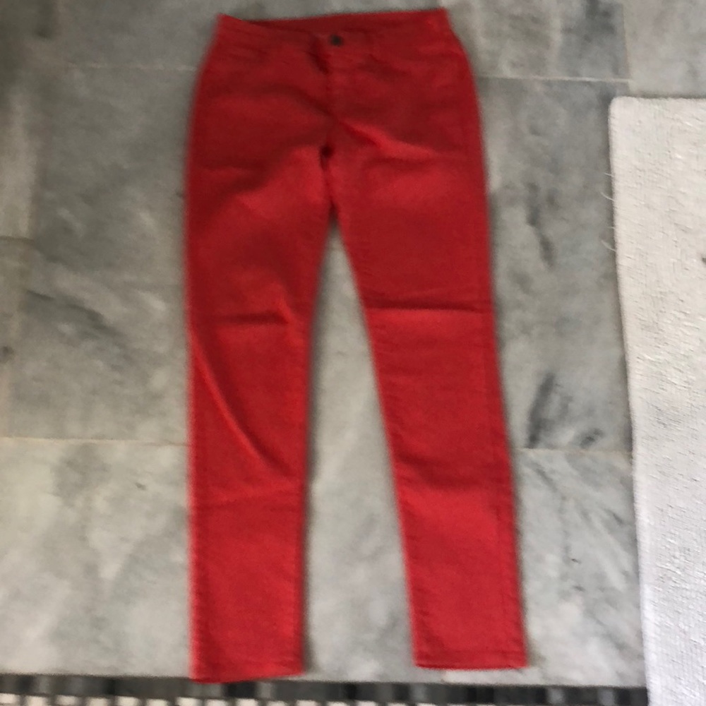 Coral stretch skinny jeans.  31” inseam,  size 28.  2 back pockets.